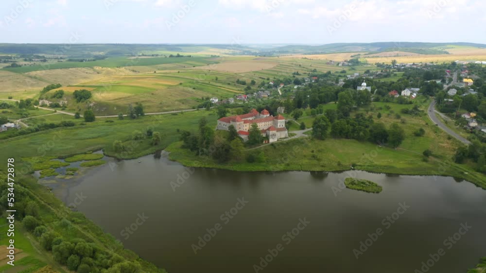 Ukrainian ancient Svirzh castle in sunny day. Filmed in UHD 4k video. Ukrainian ancient Svirzh castle in sunny day. Filmed in UHD 4k video.