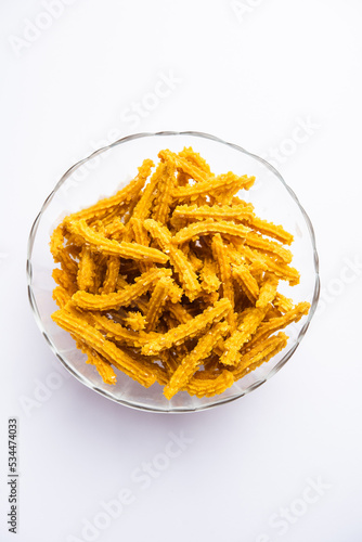 Wallpaper Mural Bhajni chakli sticks or crunchy murukku snack made using diwali festival, favourite munching food Torontodigital.ca