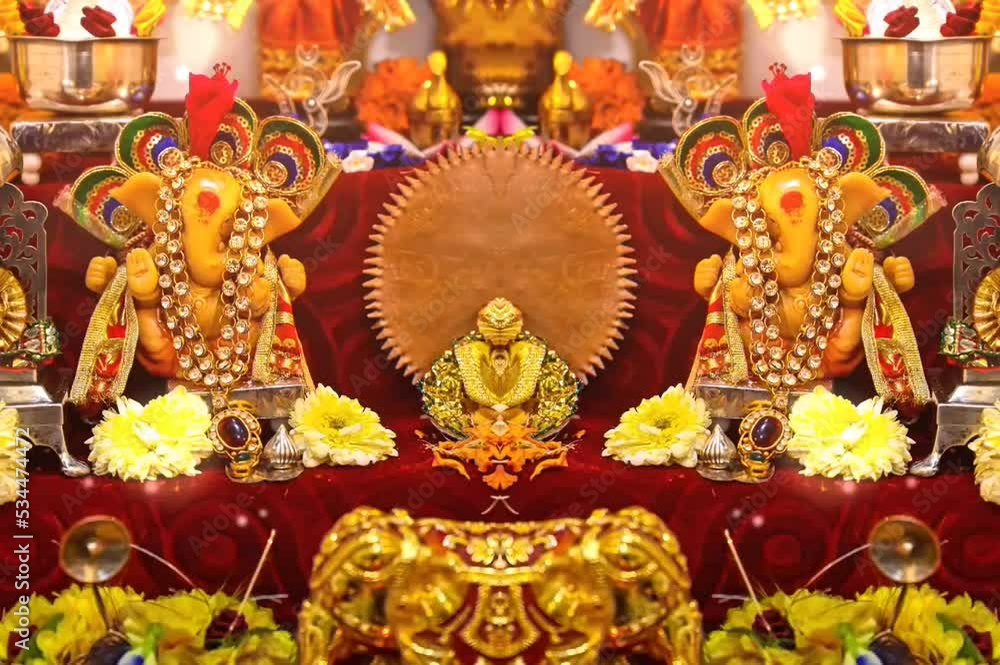 Stockvideo Lovely Golden Ganesha. Indian Main God Statue in Home Temple