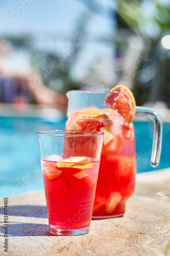 fruit cocktails by the pool