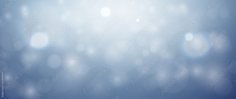 Merry Christmas background. Shiny blue sky background blurred with white crystal snowflakes and beautiful light bokeh. Christmas vector background