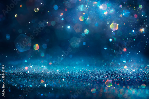 Fototapete Shiny Blue Glitter In Abstract Defocused Background - Christmas And New Year Tex