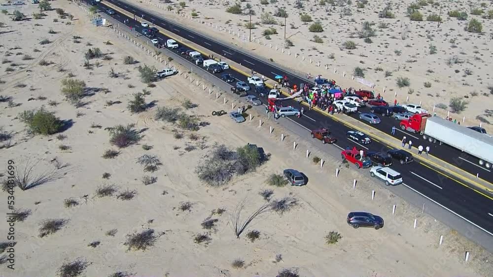 View of a drone flying back from a highway View of a drone flying back from a highway