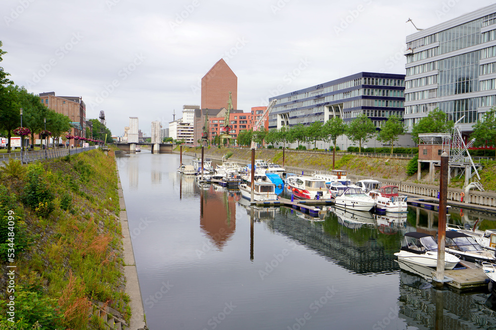 Inner harbor of Duisburg with the buildings of Mitsubishi, Hitachi, TK Gesundheit and the State Archives of North Rhine-Westphalia Duisburg, Germany
