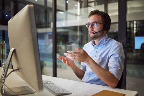 Man, work and call center in office for telemarketing with pc on desk give support to client in Canada. Crm, working and customer service at company, consultant help client on phone call in Sydney