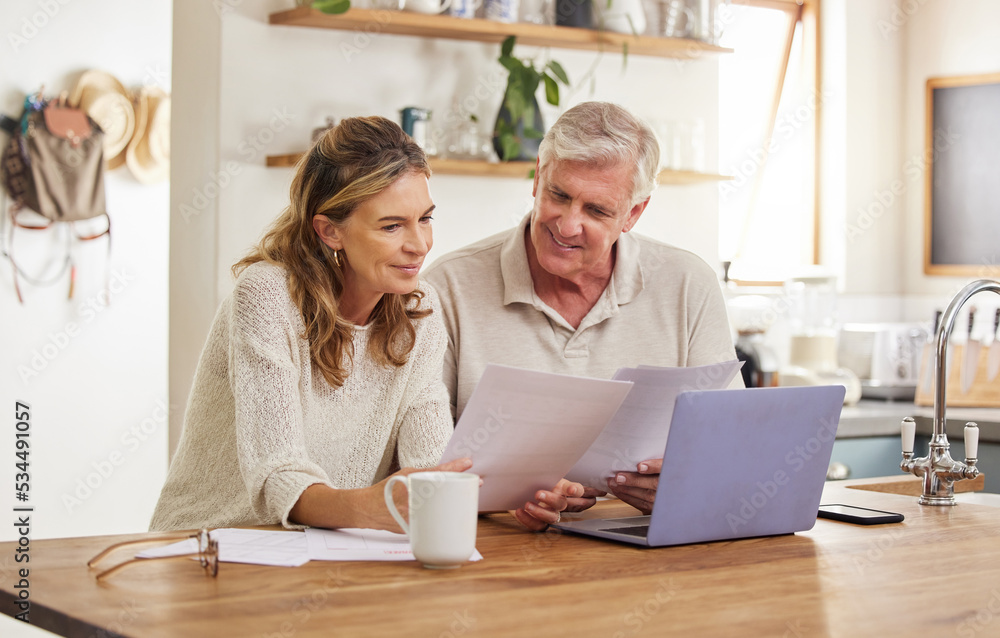 © Nina Lawrenson/peopleimages.com - Retirement, finance and couple with budget on laptop satisfied with home expenses in New Zealand. Happy, positive and married senior people checking financial documents for investment payment.