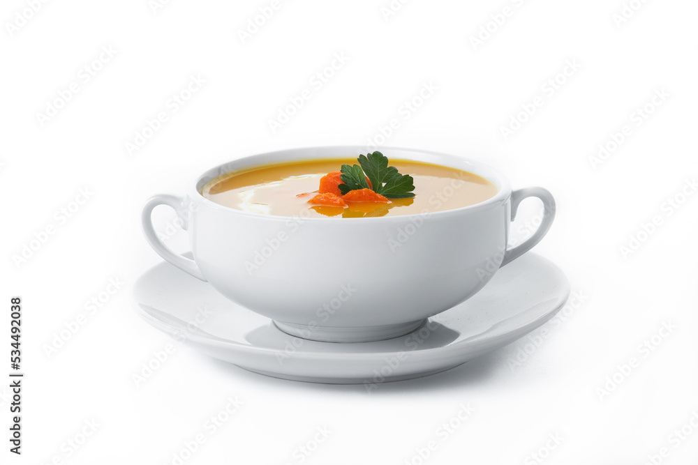 Carrot soup with cream and parsley isolated on white background Carrot soup with cream and parsley isolated on white background