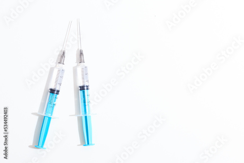 Disposable plastic syringe prepared for injection and vaccination in the hospital. The concept of medicine and health