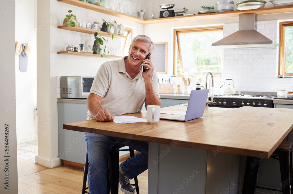 Call, laptop and finance with a senior man using a phone while planning finance, savings and investment for retirement. Computer, money and communication with an elderly male pensioner in the kitchen Call, laptop and finance with a senior man using a phone while planning finance, savings and investment for retirement. Computer, money and communication with an elderly male pensioner in the kitchen