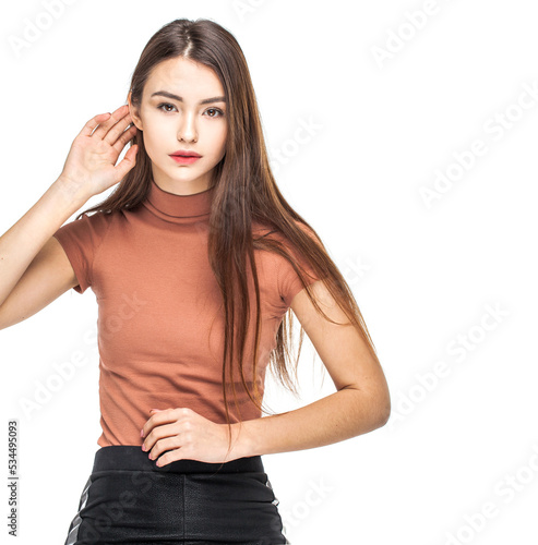 Portrait of a young beautiful brunette model, isolated on white background