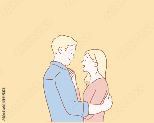 Loving couple looking into each others eyes as they stand holding each other in a moment of tenderness and smiling happily. Hand drawn style vector design illustrations.