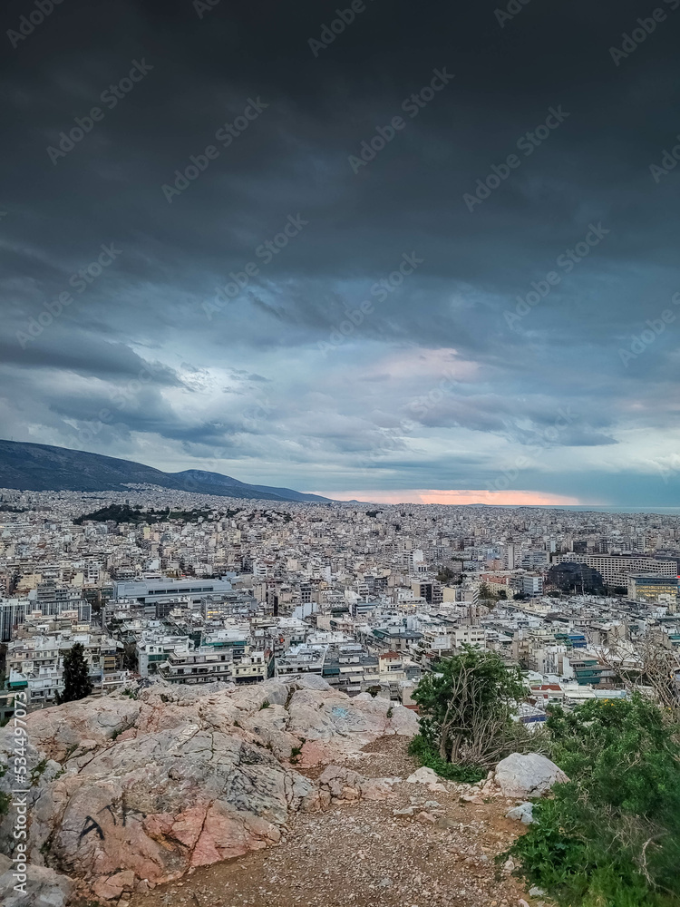 Cloudy sunset over Athens cityscape Greece