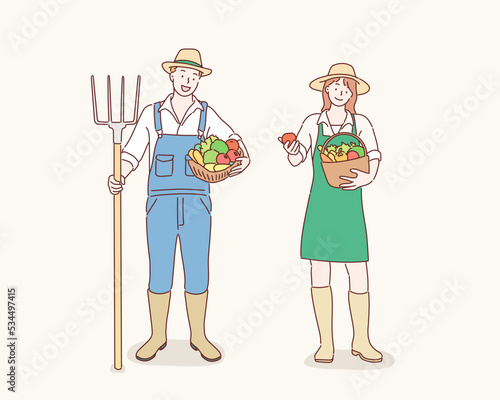 Farmers, man and woman, cartoon characters, set. Beautiful lady gardener with basket full of vegetables and handsome gardener with apple. Hand drawn style vector design illustrations.