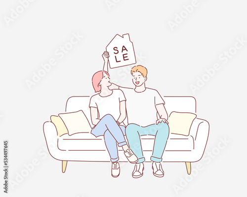 A couple is sitting on the couch with a sale sign. Hand drawn style vector design illustrations.