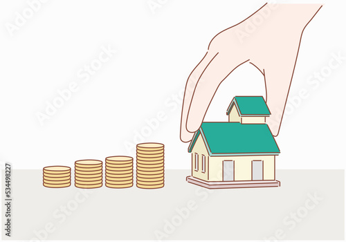 Real estate or property investment growing business. Home mortgage loan rate. Male hand holding house model with coin stack in house frame on the table. Hand drawn style vector design illustrations.