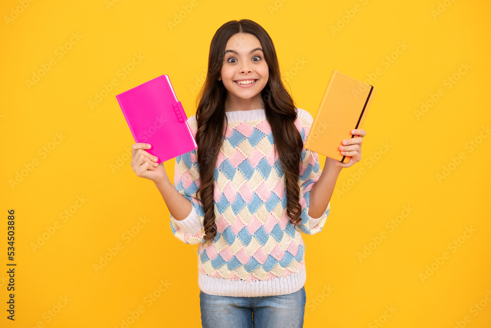 Schoolgirl with copy book posing on isolated background. Literature lesson, grammar school. Intellectual child reader. Schoolgirl with copy book posing on isolated background. Literature lesson, grammar school. Intellectual child reader.