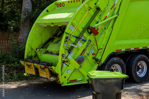 Фотография Recycling truck for mixed domestic waste collection in residential areas