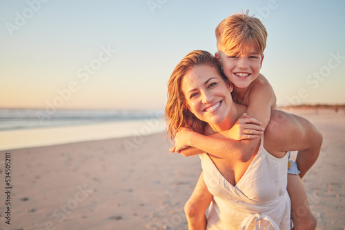 Mom, piggyback kids and portrait at beach holiday, summer vacation and ocean relax together for fun, freedom and quality time in Australia. Happy mothers day, excited boy children and sunshine sea #534505210