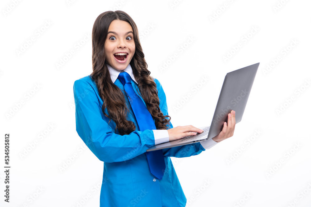 Excited face. Young girl student hold computer. Funny pupil with laptop isolated background. Back to school. Amazed expression, cheerful and glad. Excited face. Young girl student hold computer. Funny pupil with laptop isolated background. Back to school. Amazed expression, cheerful and glad.