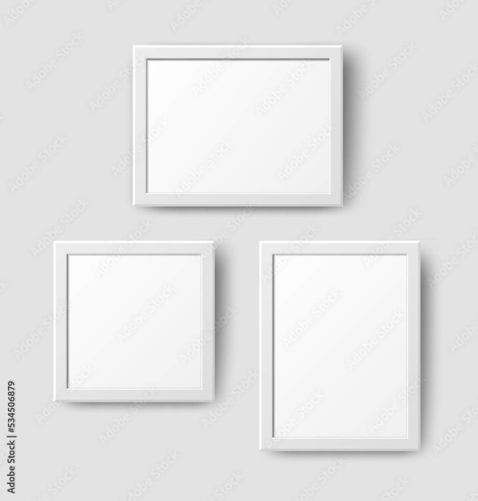 Realistic Empty Wall Photo Frame set. Vector white picture frames collage mockup template with shadow on grey wall background. Mockup for poster, banner, photo gallery, painting design, presentation. Realistic Empty Wall Photo Frame set. Vector white picture frames collage mockup template with shadow on grey wall background. Mockup for poster, banner, photo gallery, painting design, presentation.