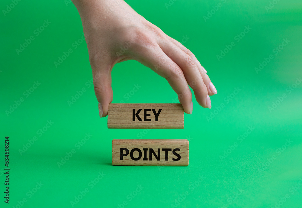 Key points symbol. Wooden blocks with words Key points. Beautiful green background. Businessman hand. Business and Key points concept. Copy space. Key points symbol. Wooden blocks with words Key points. Beautiful green background. Businessman hand. Business and Key points concept. Copy space.