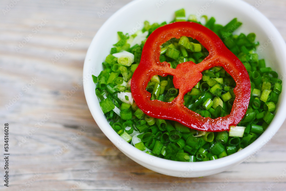 Spicy rocoto pepper with cut green onions. Spicy rocoto pepper with cut green onions.