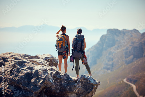 Fototapeta Naklejka Na Ścianę i Meble -  Nature, travel and hiking friends on mountain landscape with fitness, wellness and workout in summer. Freedom, rock sport or couple with backpack, health and sports exercise or training