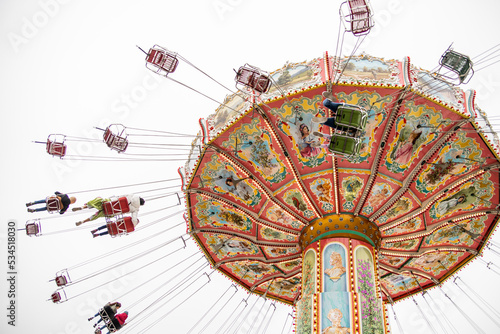 carnival swing ride at oktoberfest in munich germany