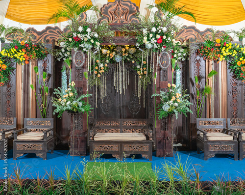 Wedding aisle decoration decorated with flowers. © Arif