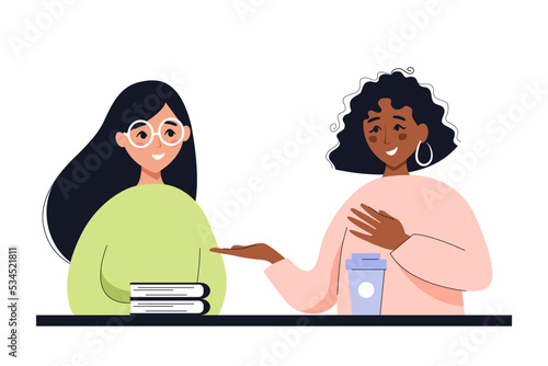 Young people communicate in public place. Concept of meeting, friendship, conversations, teamwork, training and mentoring.
