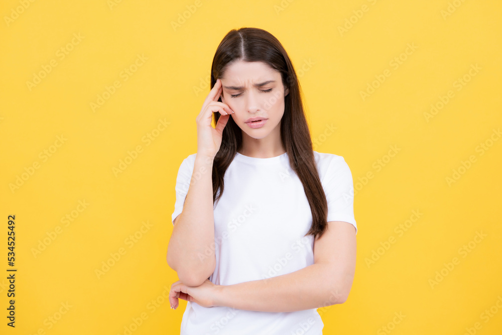 Portrait of young woman feeling stress or strain headache. Exhausted tired girl desperate and stressed because pain and migraine. Upset sad depressed model with hands on head. Portrait of young woman feeling stress or strain headache. Exhausted tired girl desperate and stressed because pain and migraine. Upset sad depressed model with hands on head.