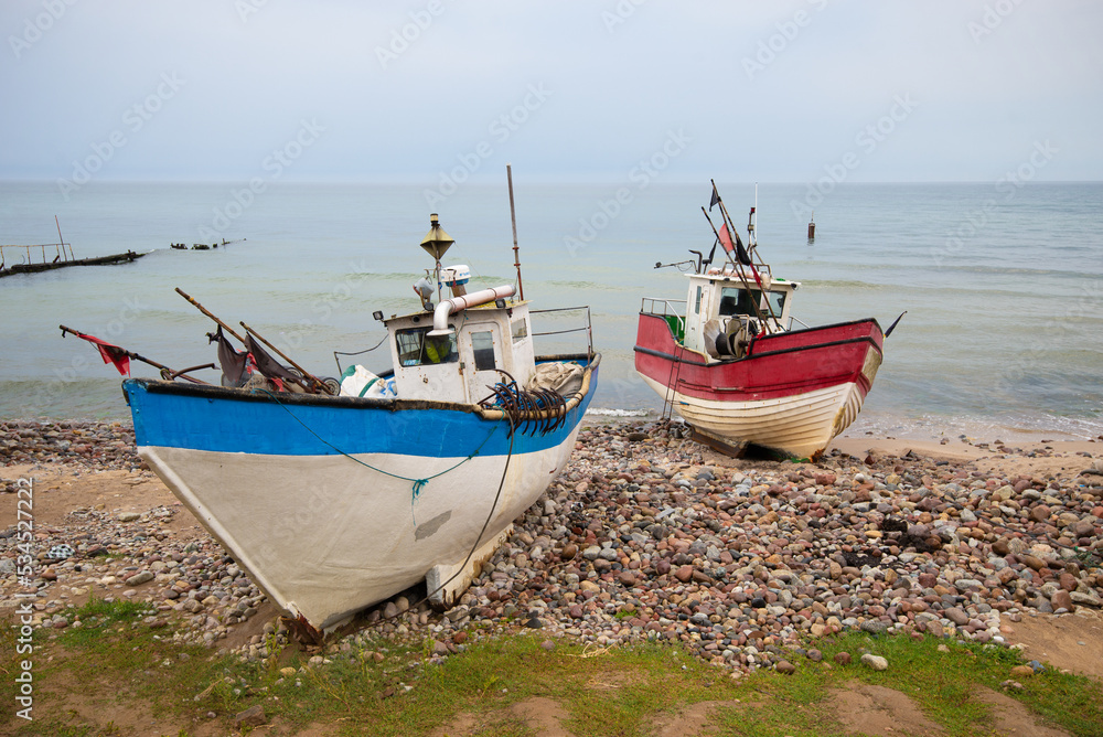 Fishing boats on the beach of the Polish Baltic coast Fishing boats on the beach of the Polish Baltic coast