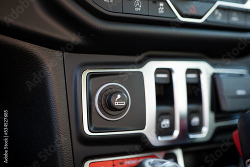 Car dashboard cigarette lighter. Close up shot, no peopl