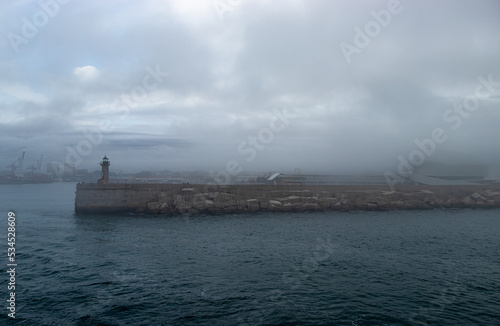 Breakwater lighthouse in the Port of Leixoes, Porto, Portugal, Europe photo