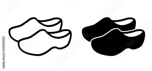 Two walk clogs, farms clogs. Traditional Dutch wooden clogs from te cite Amsterdam, Volendam and Marken. Souvenir for tourist. Holland shoe