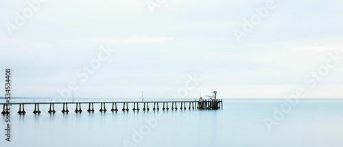 Panoramic view of the Cardwell Jetty on a cloudy day photo