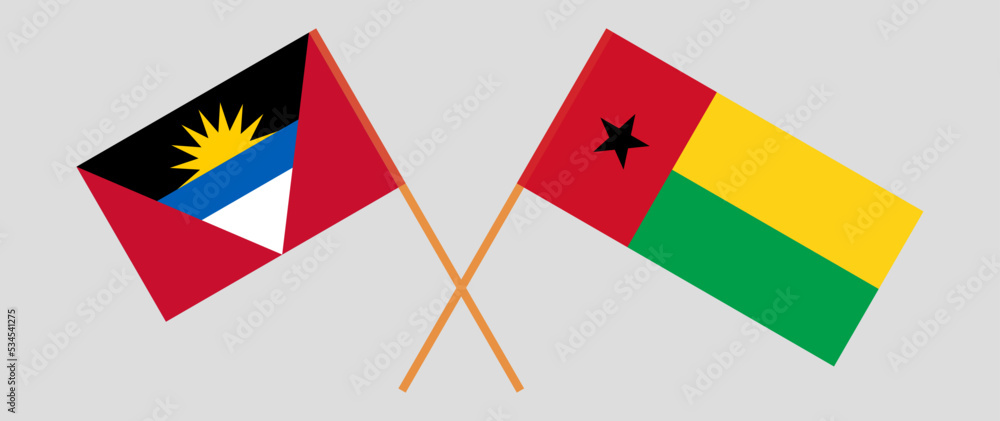 Crossed flags of Antigua and Barbuda and Guinea-Bissau. Official colors. Correct proportion Crossed flags of Antigua and Barbuda and Guinea-Bissau. Official colors. Correct proportion