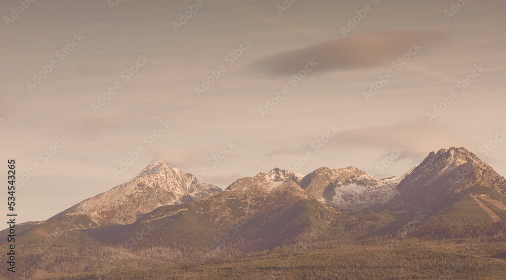 View of the morning mountains. Sunrise in the mountains. Slovak Tatras. View of the morning mountains. Sunrise in the mountains. Slovak Tatras.