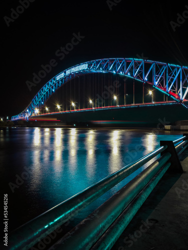 mahakam bridge is blue at night on the mahakam tenggrarong river photo