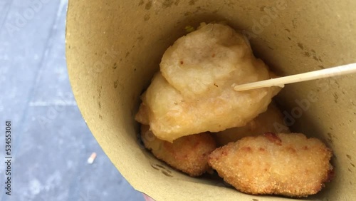 Naples street food fried in a cone, this is called cuoppo in Naples a selection of fried foods in Naples, Italy photo