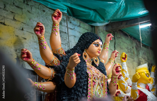 Close-up of Hindu idol goddess Durga ready to go puja mandap