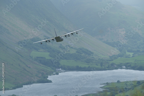 C-130 Hercules transport aircraft low level flying training in mach loop valley Wales