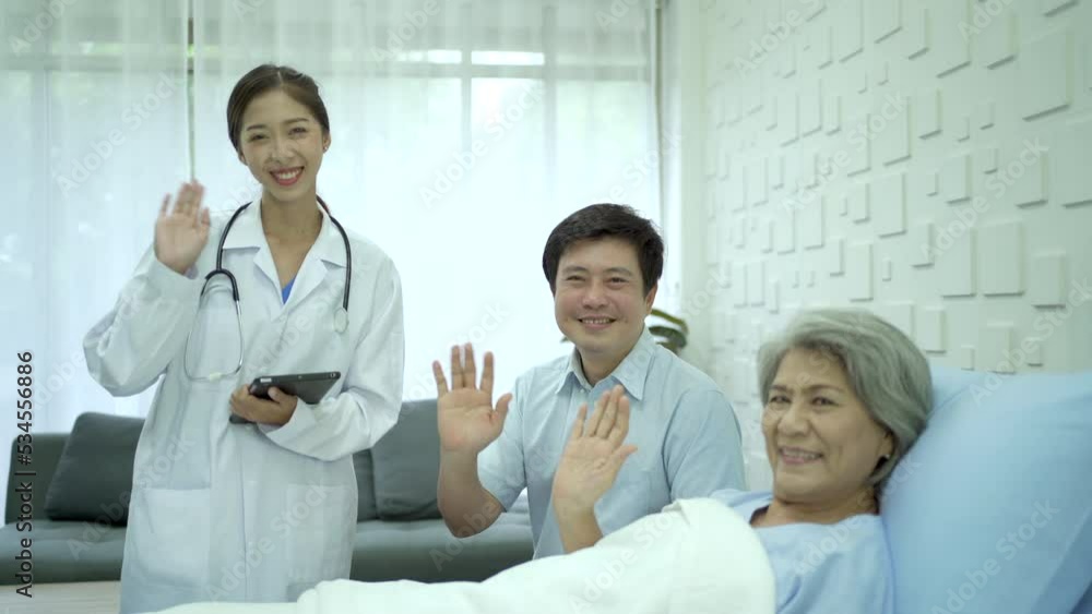 Happy people in hospital. Patient and doctor waving a hands to camera and smiling. Happy people in hospital. Patient and doctor waving a hands to camera and smiling.
