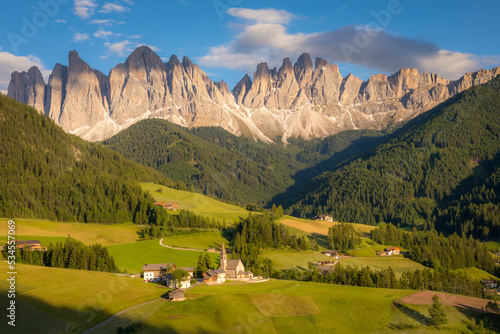 St. Magdalena with famous church in Val di Funes at sunset, Dolomites , Italy © Aide