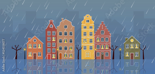 Rainy autumn night banner panorama in european city street 