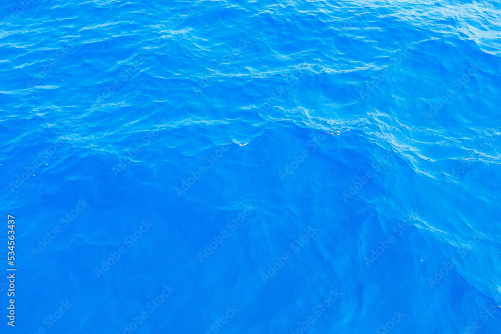 Very nice sea water background or backdrop with selective focus. Small waves of natural water surface texture. Very nice sea water background or backdrop with selective focus. Small waves of natural water surface texture.
