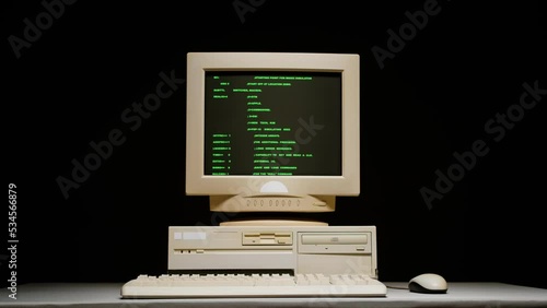 Retro pc with loading code console, programmer making scripts, green basic screen, Old computer studio close-up, Desktop vintage retro wave display, late 90s PC.