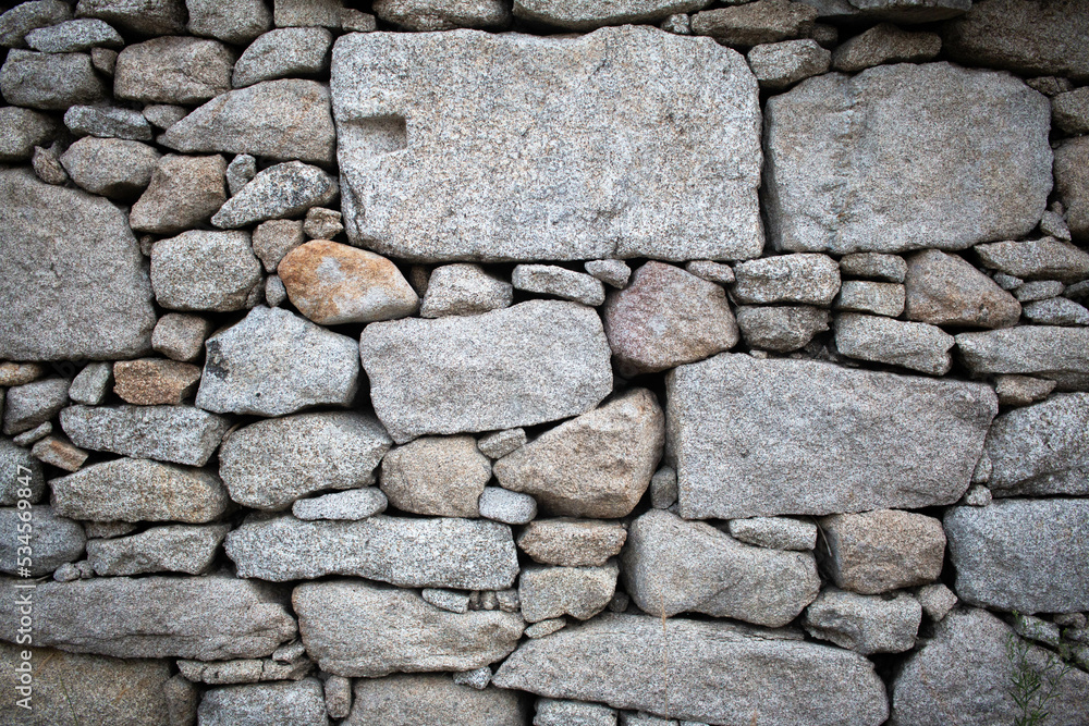 Textura de piedras de una fachada de una casa 