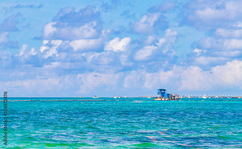 Obraz premium Boats yachts ship jetty beach in Playa del Carmen Mexico.