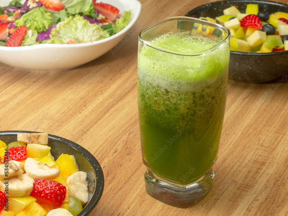 green juice with fresh fruit salad green juice with fresh fruit salad